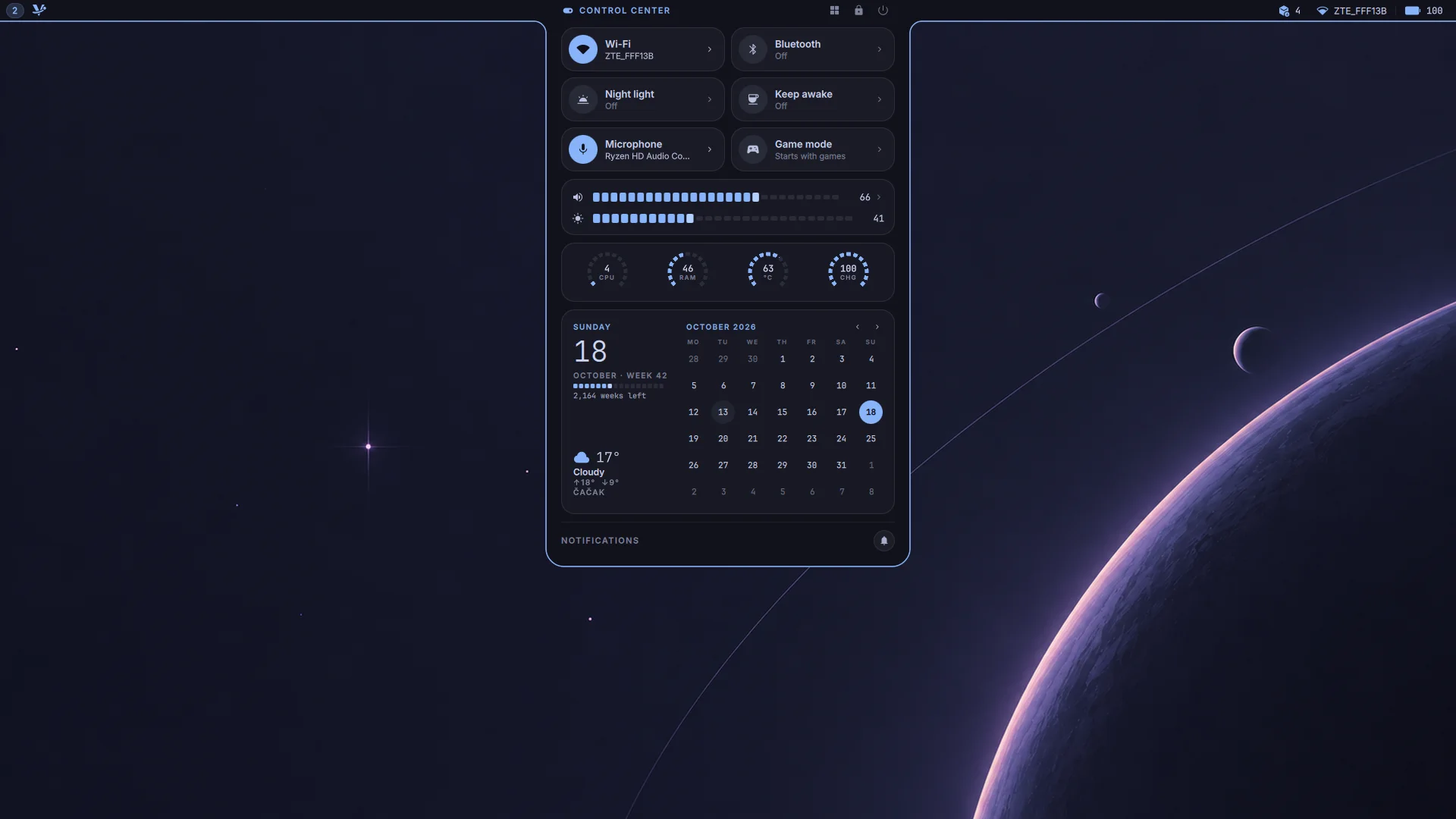 The Vyntaris desktop with the island open as the control center: Wi-Fi, Bluetooth, night light and the microphone as tiles, volume and brightness, the processor and memory, and this month's calendar with the weather.